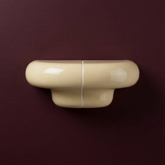 Orbi Shelf Soft Butter on Deep Burgundy Wall