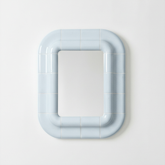 Ice Blue ceramic-look mirror with rounded rectangular frame, front view.