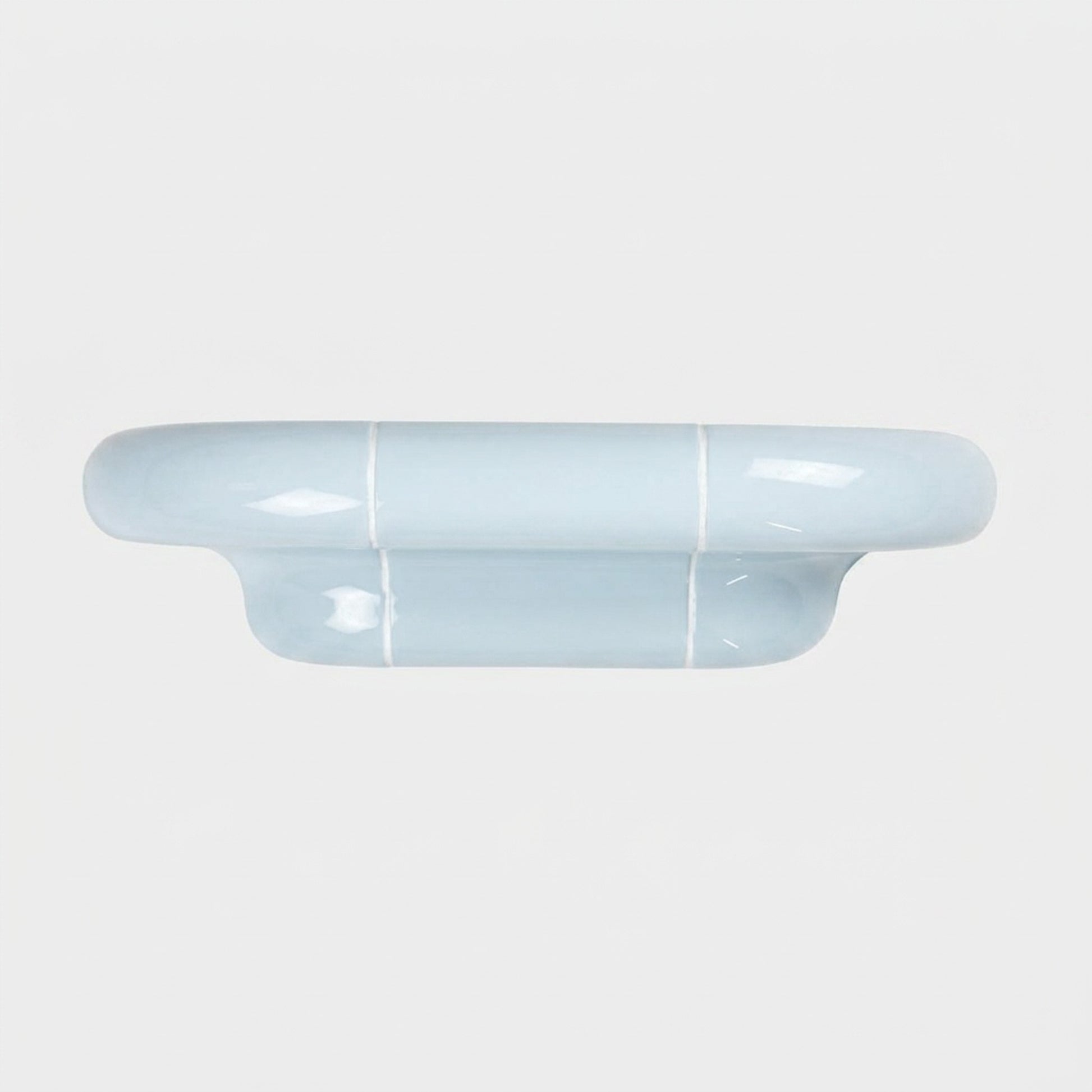 Orbi S floating shelf in glossy Ice Blue with a handcrafted modular construction.