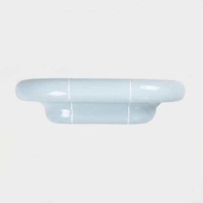 Orbi S floating shelf in glossy Ice Blue with a handcrafted modular construction.