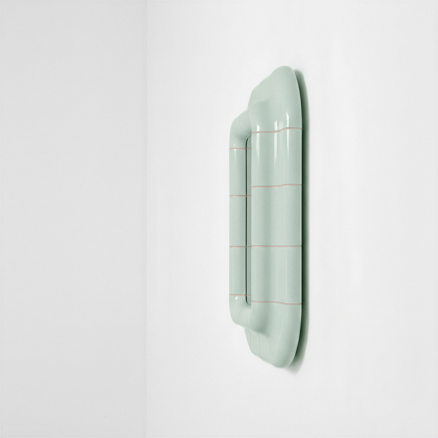 Side view of the Soft Mint ceramic-look mirror showing frame depth and curved profile.