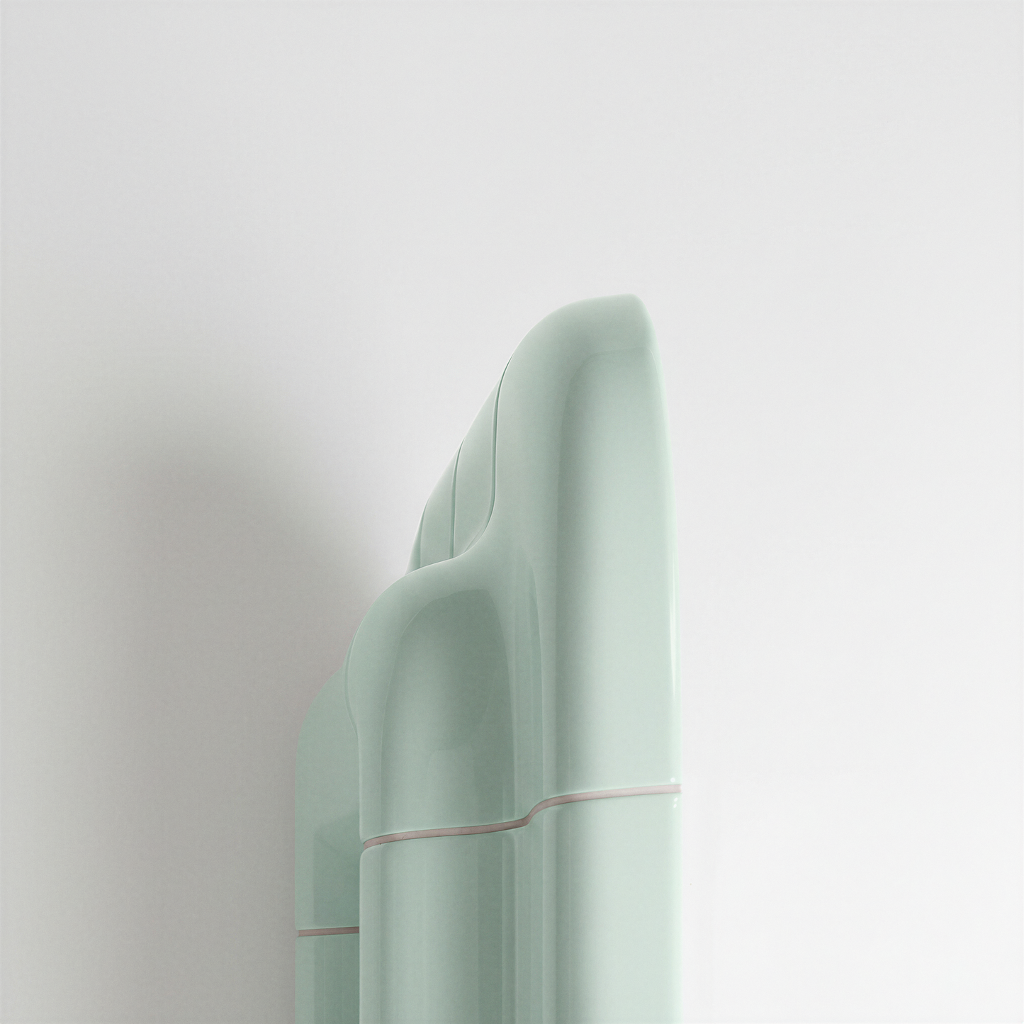 Close-up side detail of the Soft Mint ceramic-look mirror frame.