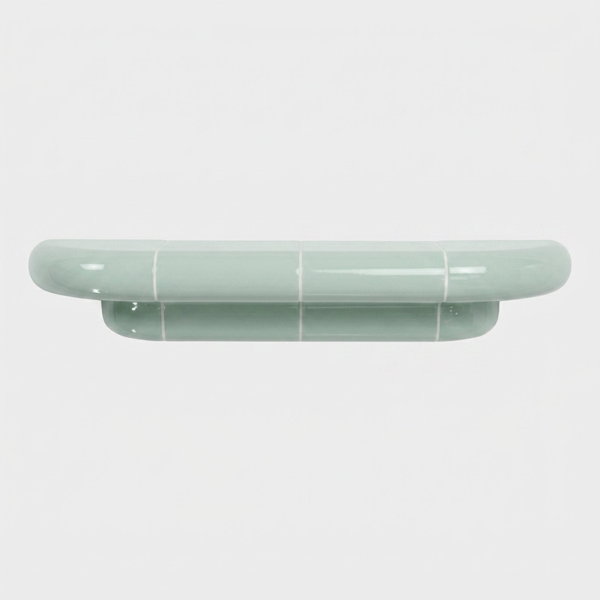Orbi M floating shelf in glossy Pastel Mint, handcrafted designer shelf with rounded forms.