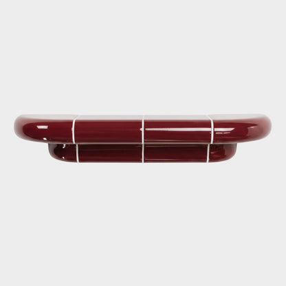Orbi M floating wall shelf in glossy Deep Burgundy, handcrafted modular designer shelf.