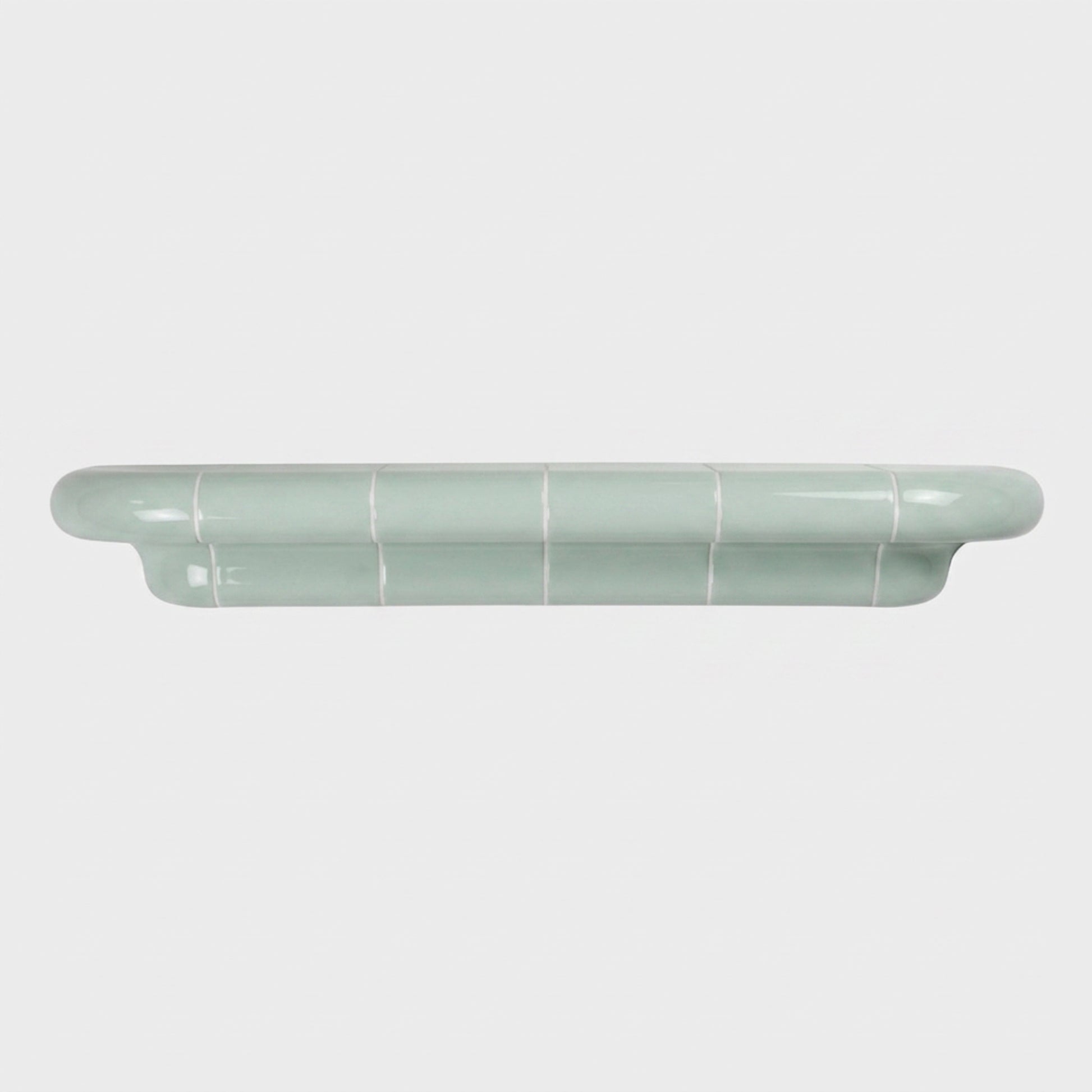 Orbi XL floating shelf in glossy Pastel Mint, statement wall shelf for modern interiors.