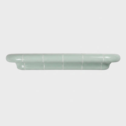 Orbi XL floating shelf in glossy Pastel Mint, statement wall shelf for modern interiors.