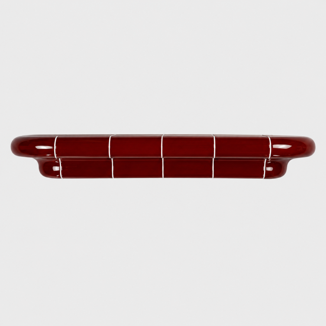 Orbi XL floating shelf in glossy Deep Burgundy, handcrafted wall shelf for contemporary interiors.