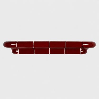 Orbi XL floating shelf in glossy Deep Burgundy, handcrafted wall shelf for contemporary interiors.