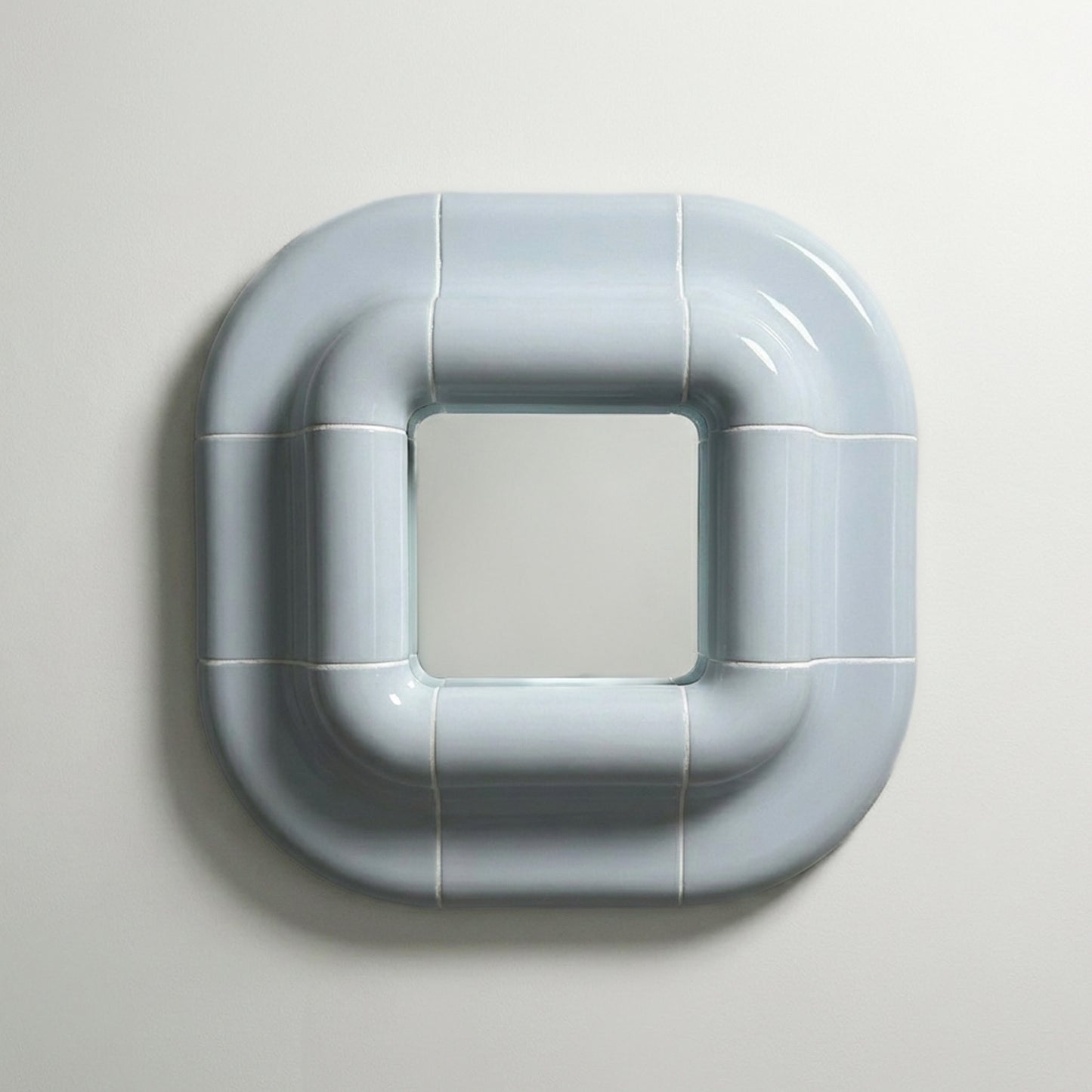 Lolo wall mirror in Ice Blue by Tilecito, square sculptural mirror with rounded tile-inspired frame, front view