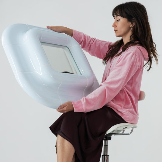 Lolo mirror in ice blue high gloss finished hold by Celia