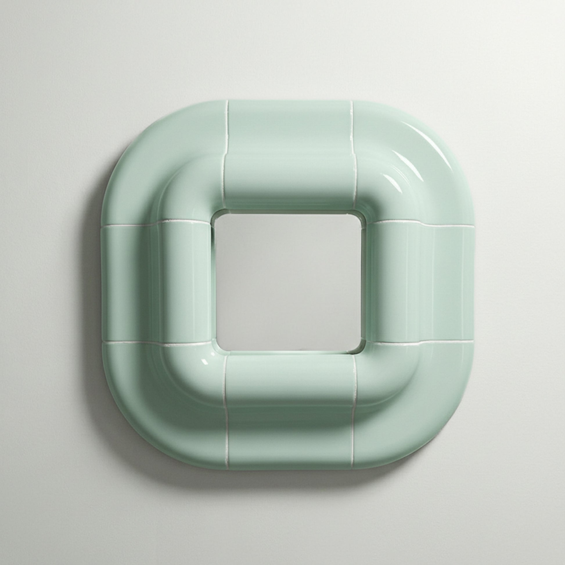 Lolo wall mirror in Pastel Mint by Tilecito, square sculptural mirror with rounded tubular frame, front view