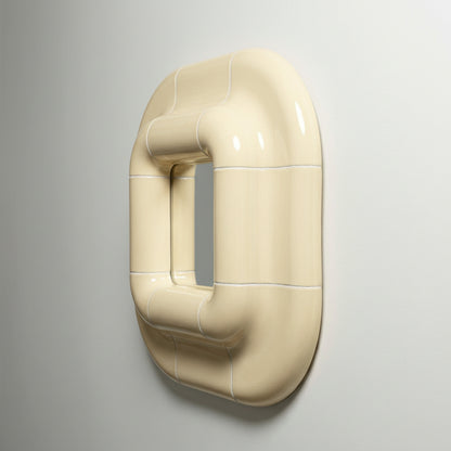 Side view of Lolo ceramic mirror in Soft Beige by Tilecito, showing 13.5 cm depth and sculptural tubular ceramic frame
