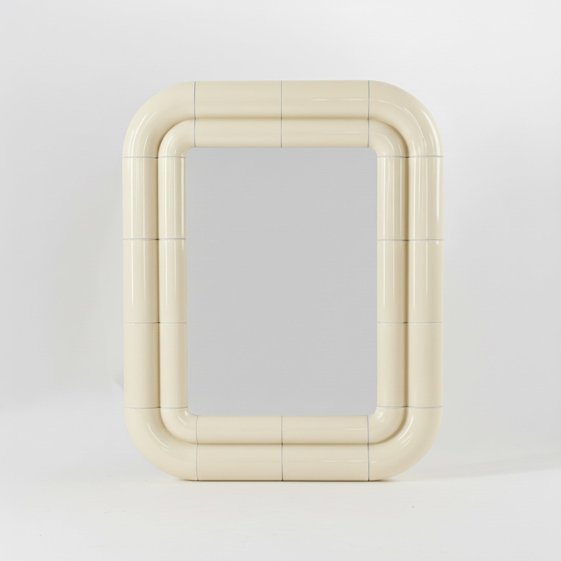 Portalito mirror in Soft Butter, square tubular frame with glossy ceramic-like finish, front view