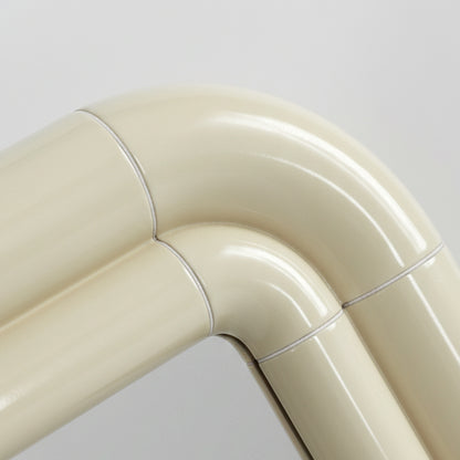 Detail of Portalito frame in Soft Butter, smooth curved surface with visible joints