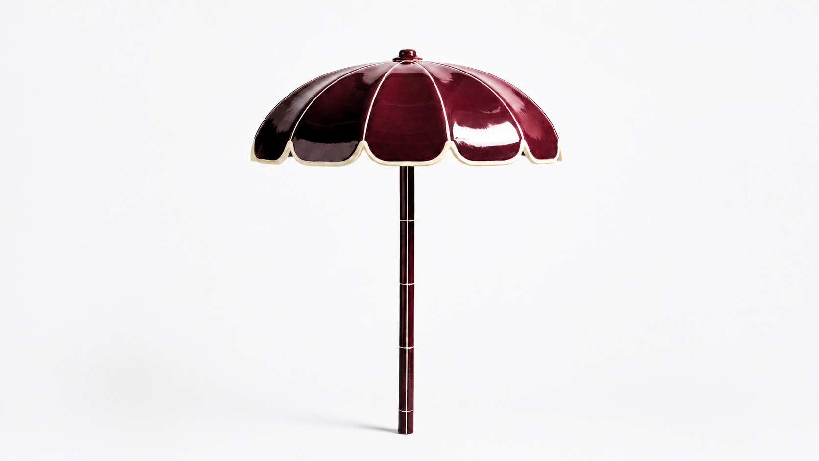 Deep Burgundy ceramic-style umbrella on a clean white background.